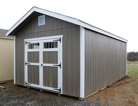 Pine Creek 12x20 HD New England Peak with Driftwood walls, White trim and White shutters, and Charcoal shingles