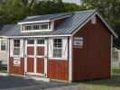 10x16 Cape Cod Style Storage Shed with metal roof and Cape Dormer from Pine Creek Structures